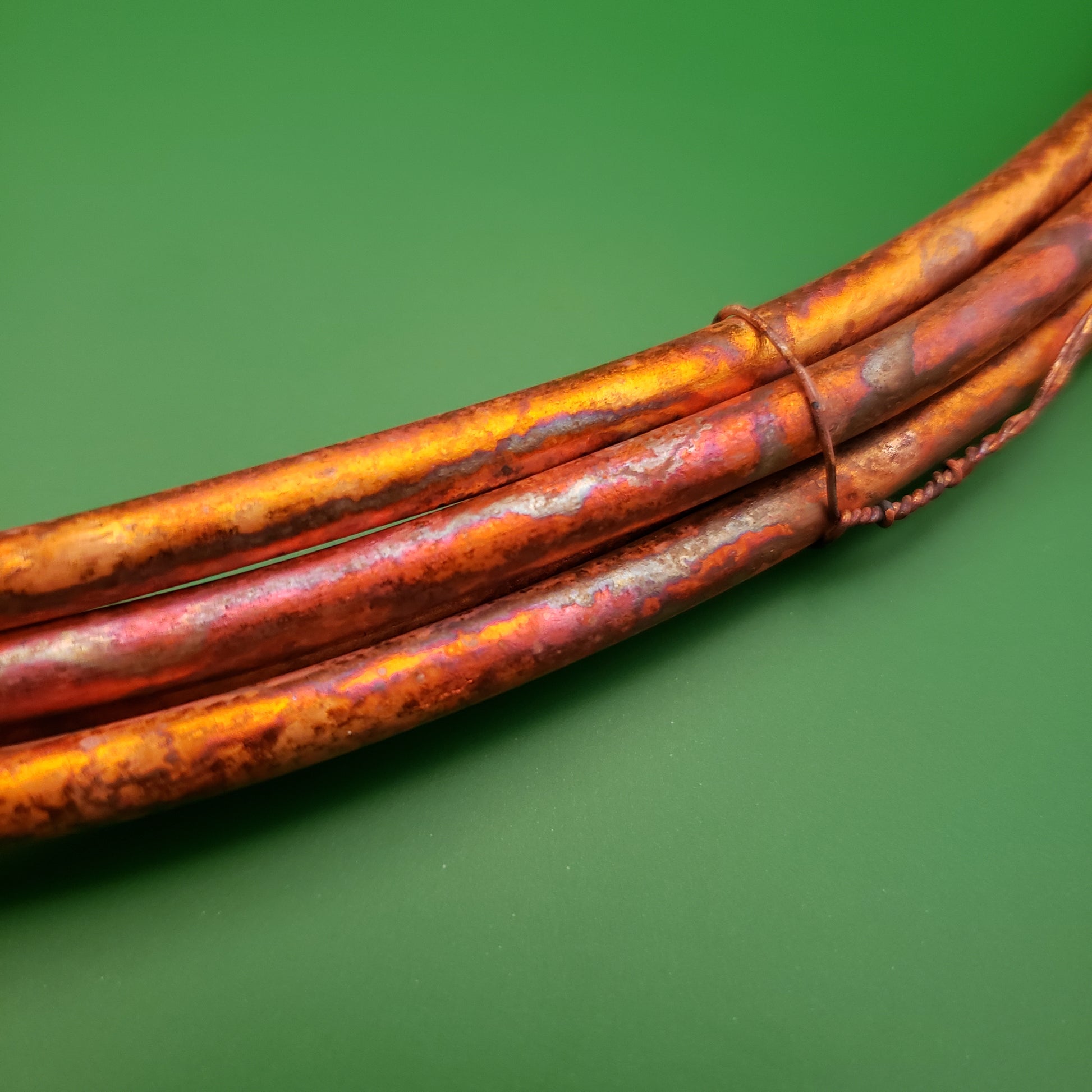 4 gauge annealed copper bonsai wire on green background front view